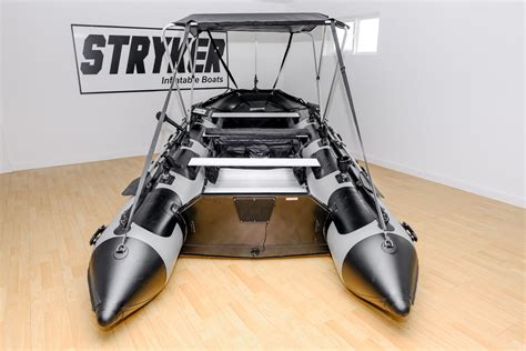 Stryker boats - As an added bonus, a sun shade bimini top and 2 Scotty® baitcasters fishing rod holders. This Stryker Inflatable Boat package comes in 2 bags, 1 for your boat and 1 for your aluminum floor system. Dimensions of boat in bag: 56 x 31 x 16". Boat Only Weight: 220lbs. Dimensions of aluminum floor in bag: 47 x 30 x 7". Floor Only Weight: 105lbs. 